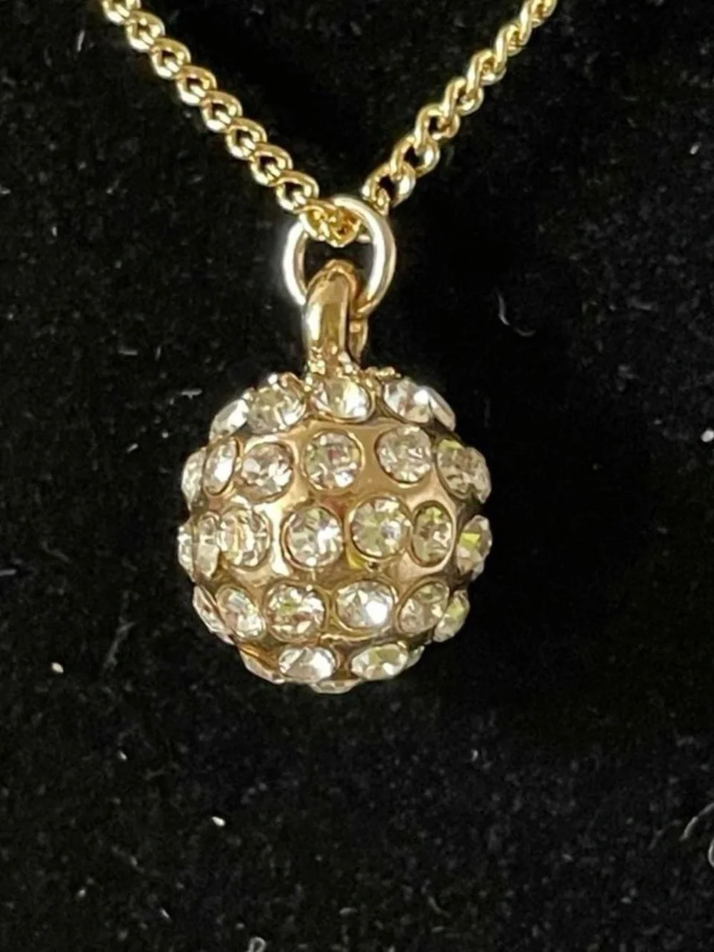 Golden ball rhinestone necklace.